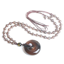 Load image into Gallery viewer, Handcrafted Natural Translucent Black Obsidian Donut Pendant Necklace
