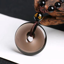 Load image into Gallery viewer, Handcrafted Natural Translucent Black Obsidian Donut Pendant Necklace
