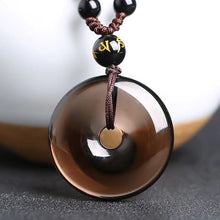 Load image into Gallery viewer, Handcrafted Natural Translucent Black Obsidian Donut Pendant Necklace
